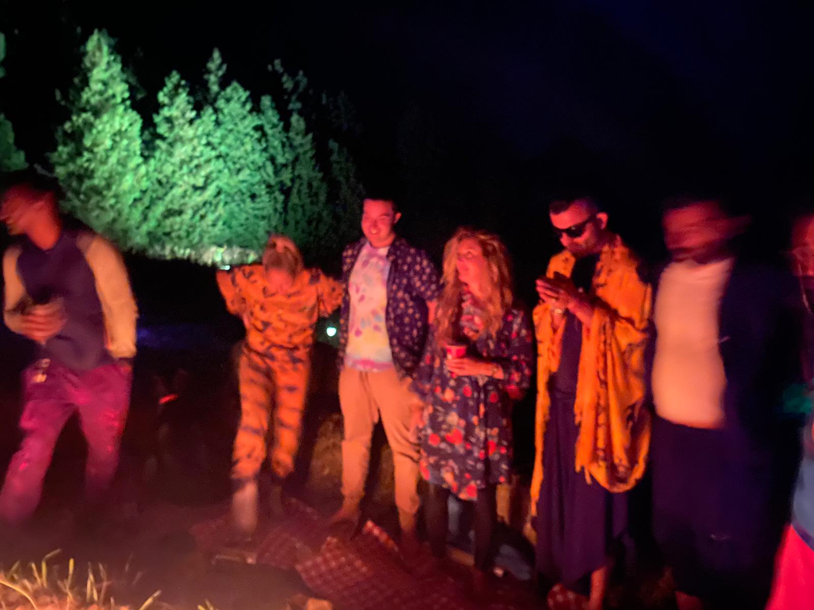 Nighttime campfire gathering on the farm